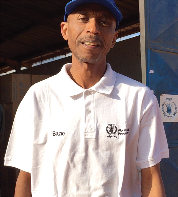 BRUNO RAKOTOSAN in front of WFP warehouse